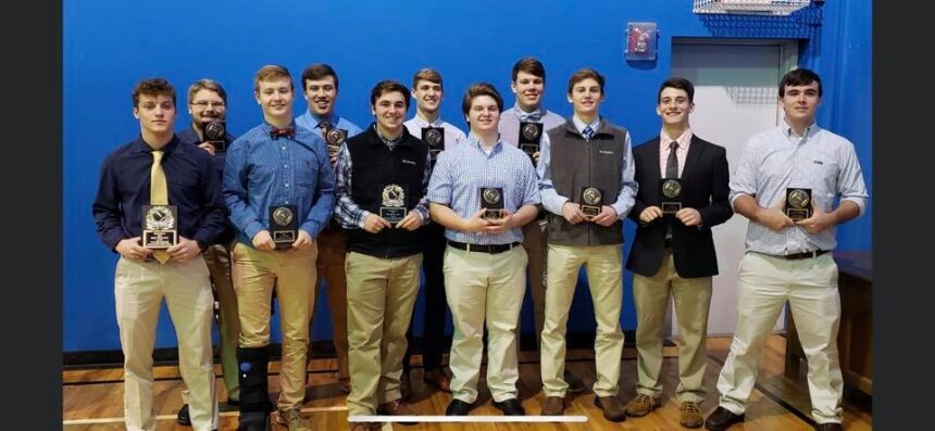 Raider football players and Coach Dobbs win post season honors