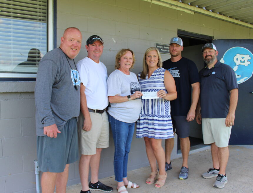 Legends of UT make donation to Moore County Football